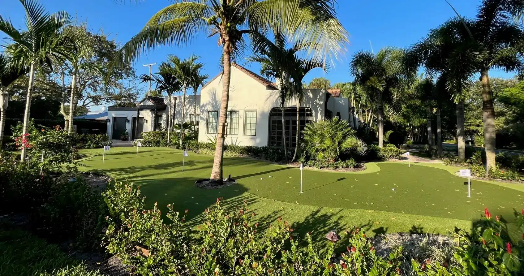 residential artificial grass lawn backyard putting green