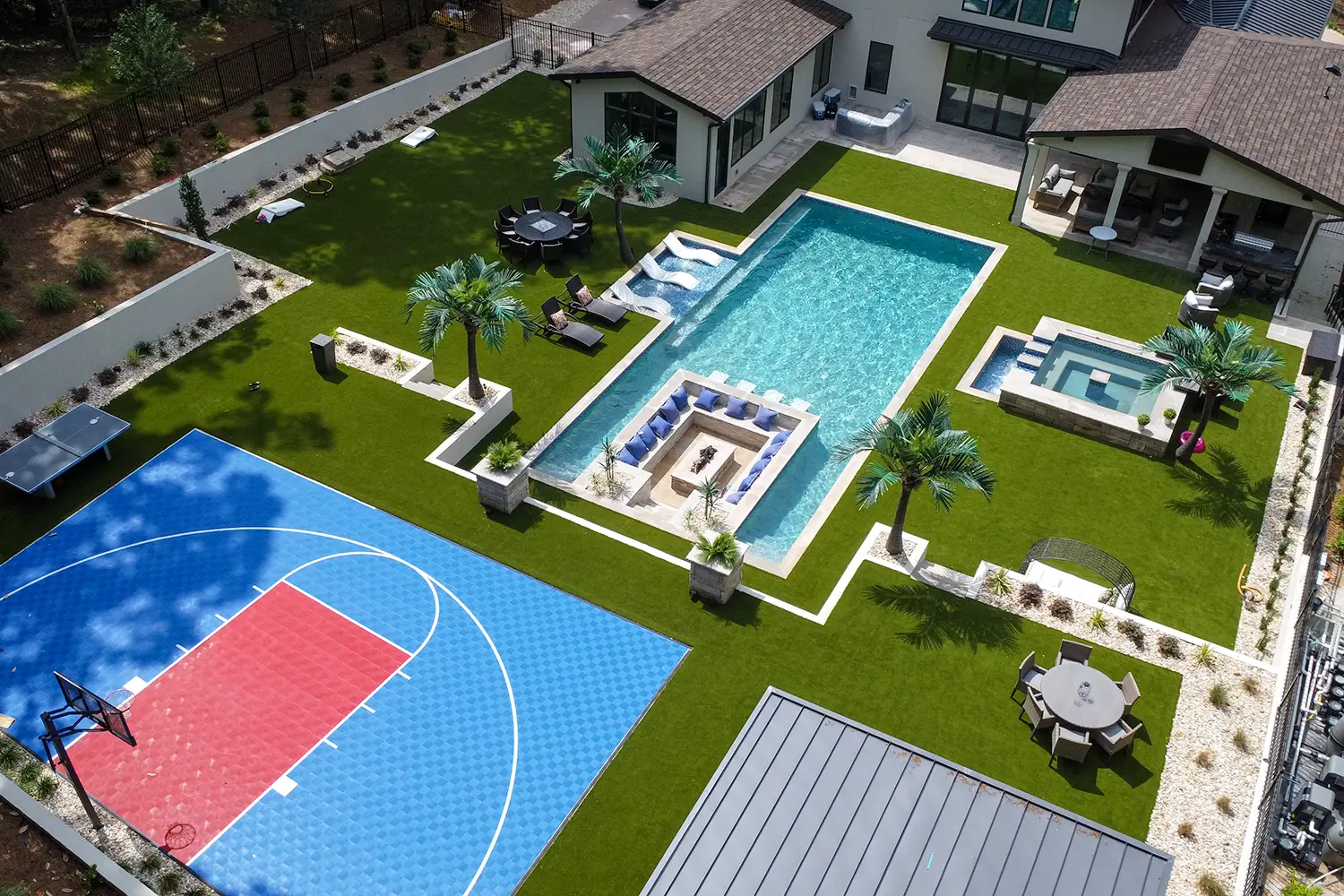 Artificial grass pool area drone shot from SYNLawn West Palm Beach